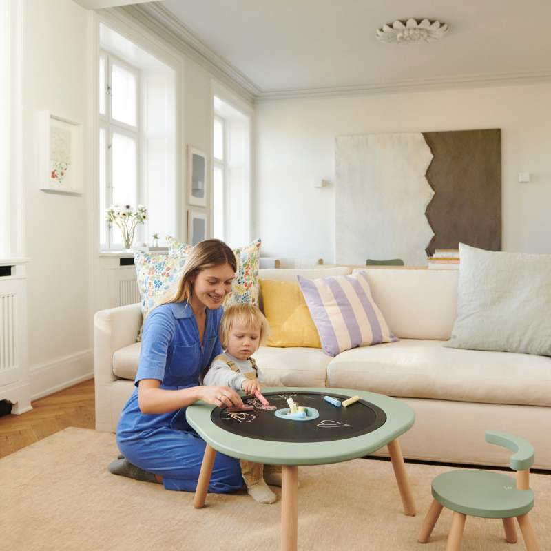 Stokke MuTable V2 study and play table, made from natural wood, with safe anti-slip base