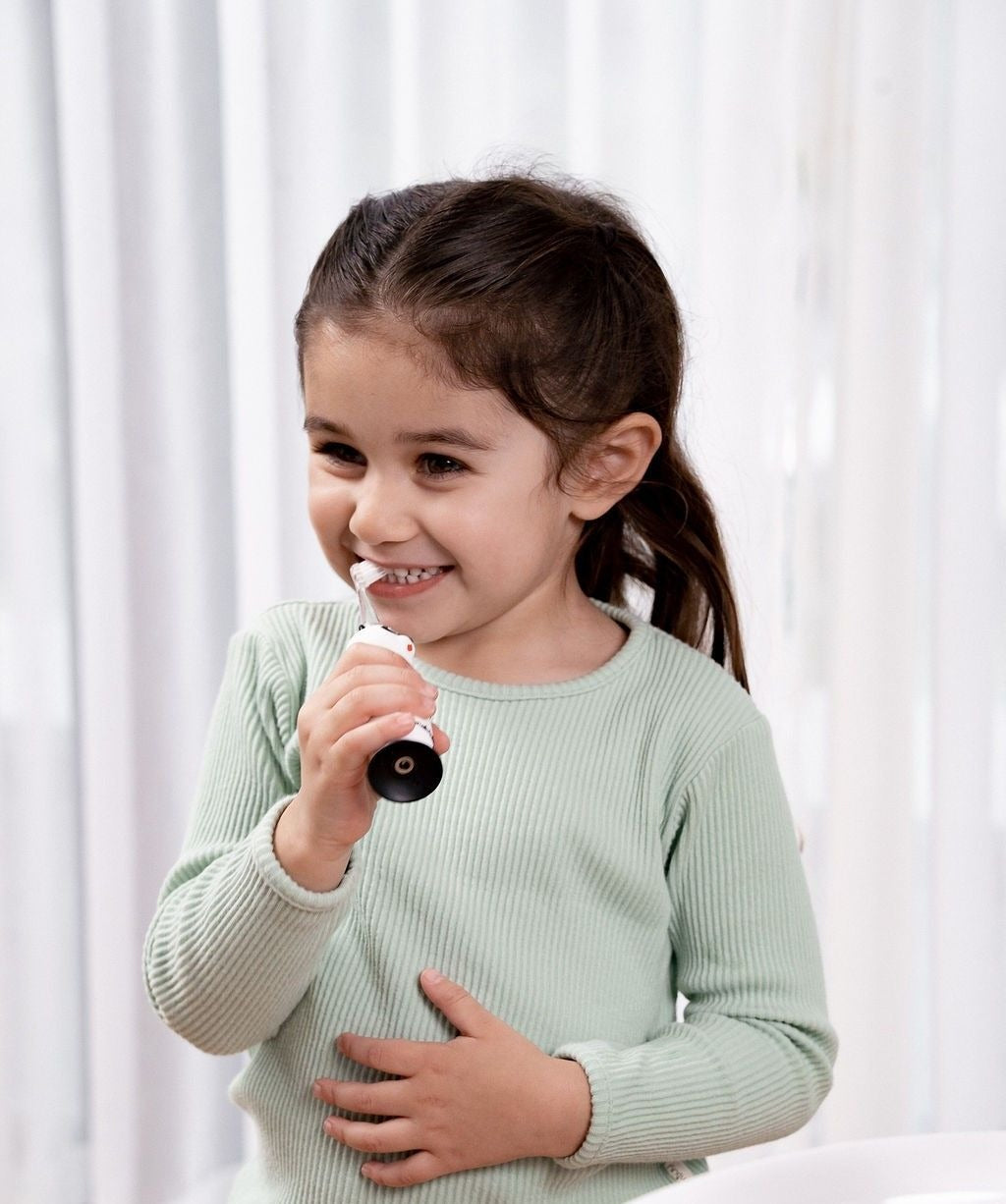 Brush-Baby Bàn Chải Điện Sóng Âm WildOnes Kèm Sạc 2 Chế Độ Làm Sạch Răng An Toàn Và Hiệu Quả Cho Bé (0–10 Tuổi)