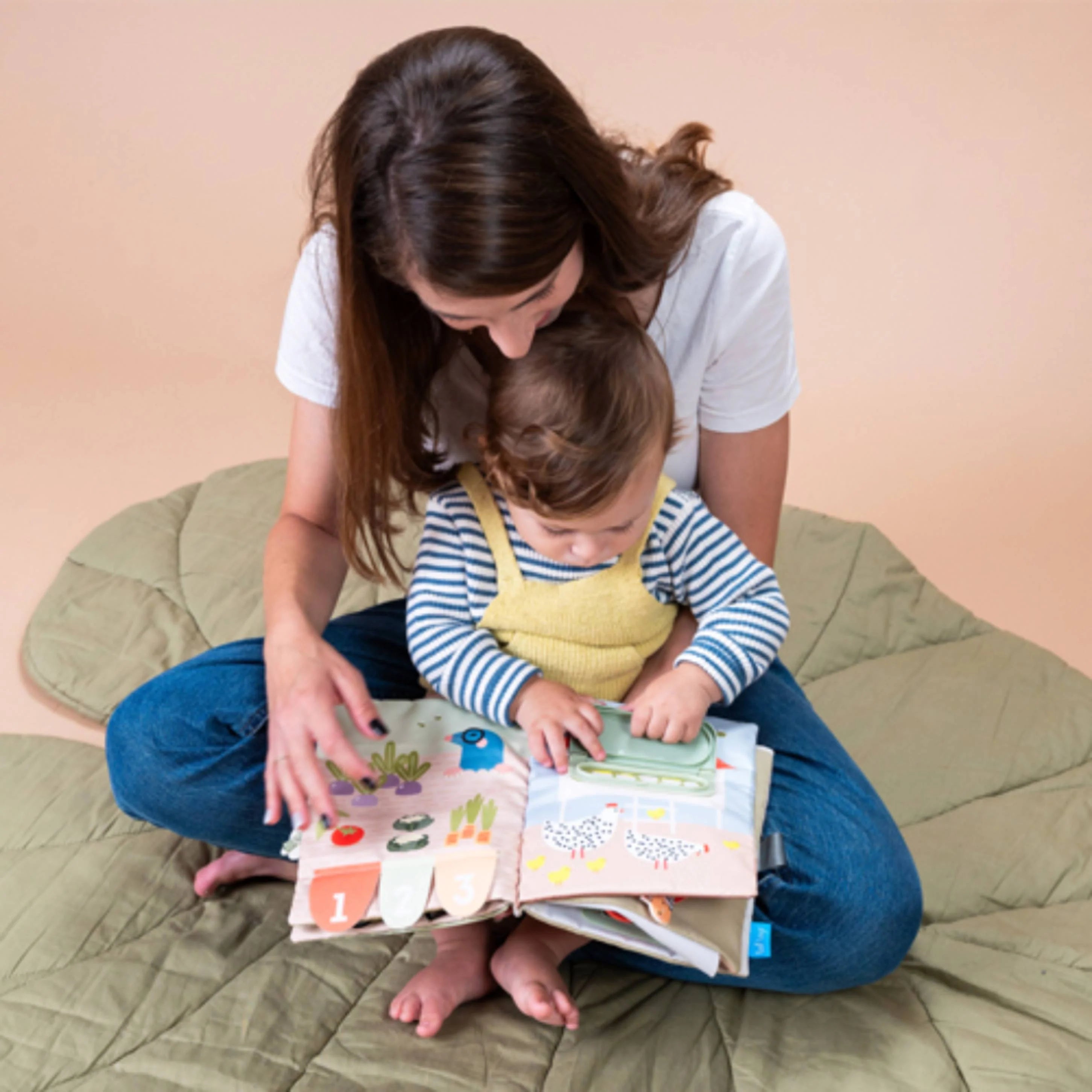 Cloth books and activity sheets for skill development