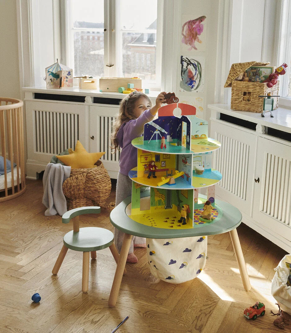Stokke MuTable children's study and play table, made from natural wood, with safe anti-slip base