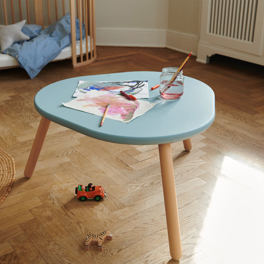 Stokke MuTable children's study and play table, made from natural wood, with safe anti-slip base