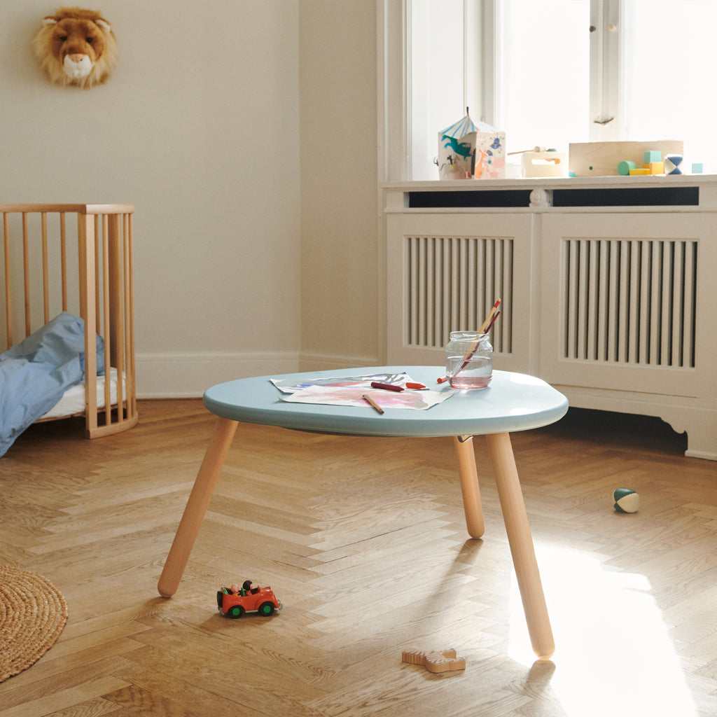 Stokke MuTable children's study and play table, made from natural wood, with safe anti-slip base